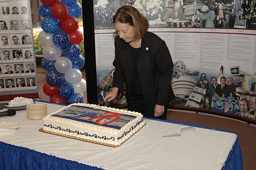 Commissioner Barnhart cuts ceremonial cake in Baltimore