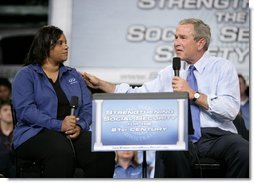President George W. Bush leads the discussion on stage with Cynthia Roberts, a Nissan employee, during a Conversation on Strengthening Social Security Tuesday, May 3, 2005 at the Nissan North America Manufacturing Plant in Canton, Miss.  White House photo by Eric Draper