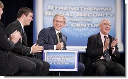 President George W. Bush shares in the on-stage laughter Thursday, June 23, 2005, as he's joined by Ben Ferguson, far left, Brian Smart, and Ben Stein during his Conversation on Strengthening Social Security at Montgomery Blair High School in Silver Spring, Maryland.  White House photo by Paul Morse