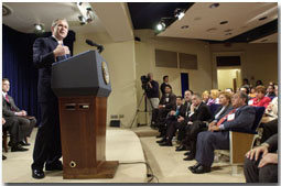 President Bush at lectern speaking