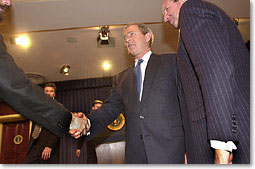 President shaking hands