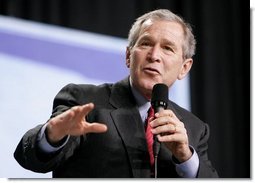 President George W. Bush leads the discussion on stage during a Conversation on Strengthening Social Security at the Pease International Tradeport Airport, Wednesday, Feb. 16, 2005. 