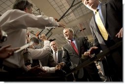 President George W. Bush greets the crowd at Auburn University at Montgomery in Montgomery, Alabama after talking about Social Security reform on Thursday March 10, 2005. White House photo by Paul Morse 