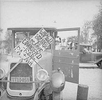 photo of old car with Townsend sign