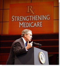 President George W. Bush addresses the audience at Devos Performance Hall in Grand Rapids, Mich., Wednesday, Jan. 29, 2003. "I urged the Congress last night to put aside all the politics and to make sure the Medicare system fulfills its promise to our seniors," President Bush said. "I believe that seniors, if they're happy with the current Medicare system, should stay on the current Medicare system. That makes sense. If you like the way things are, you shouldn't change. However, Medicare must be more flexible. Medicare must include prescription drugs." White House photo by Tina Hager.