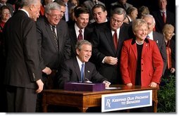 President George W. Bush signs H. R. 1, the Medicare Prescription Drug, Improvement and Modernization Act of 2003, at Constitution Hall in Washington, D.C., Dec. 8, 2003. "With this law, we are providing more access to comprehensive exams, disease screenings, and other preventative care, so that seniors across this land can live better and healthier lives," said President Bush. White House photo by Paul Morse.