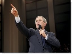 President George W. Bush acknowledges members of the audience during his Town Hall meeting on strengthening Social Security in Raleigh, N.C., Thursday, Feb. 10, 2005. White House photo by Eric Draper.