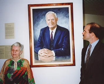 Clark posing with painting