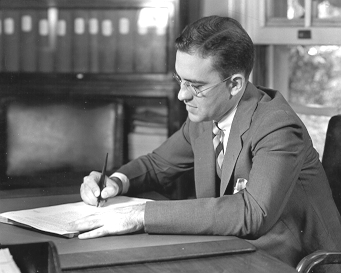 John Corson at desk