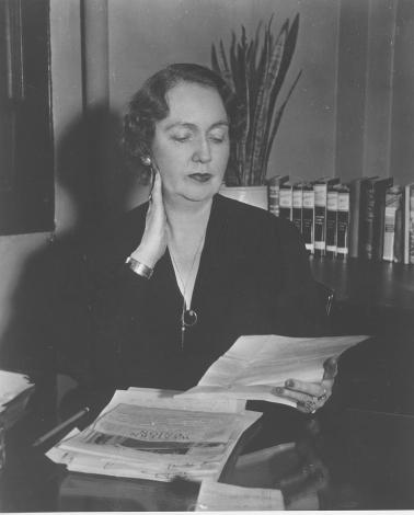 photo of Ellen Woodward at her desk