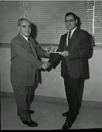 Herb handing award