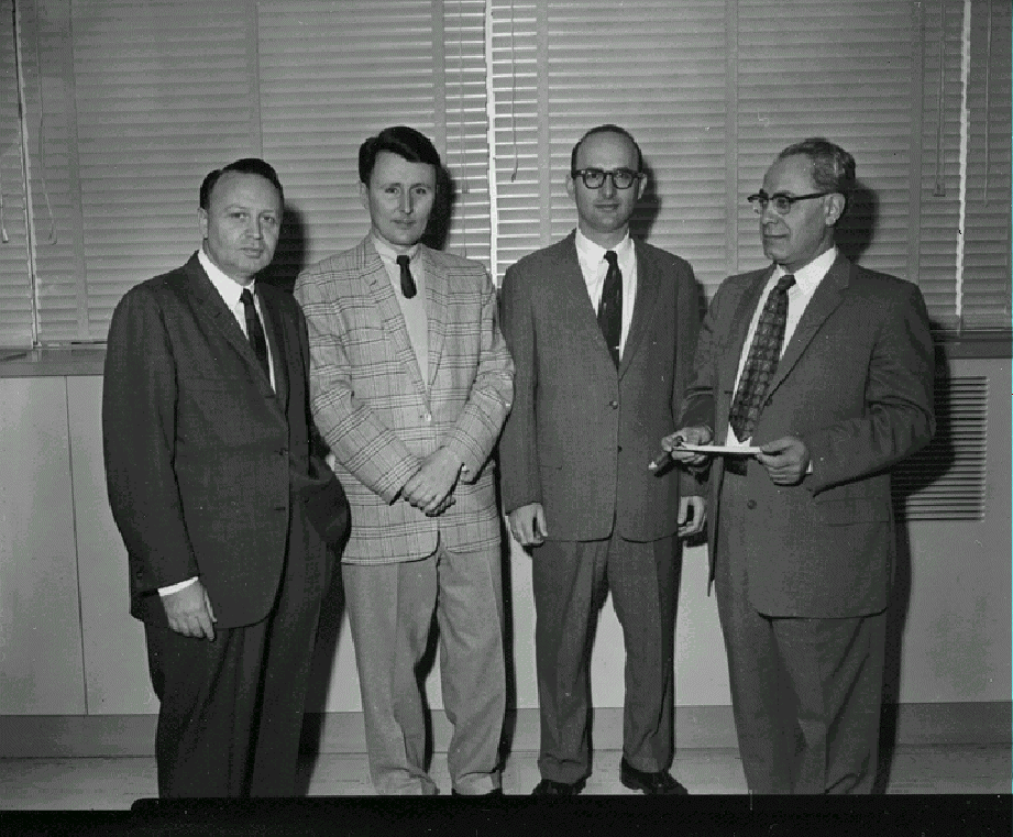 four men in suits
