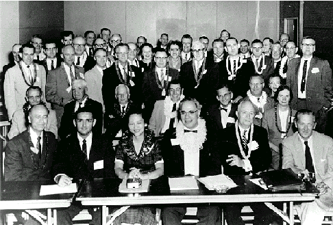 large group behind table