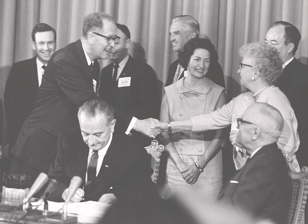 Senator Anderson shakes hands with Mrs. Truman
