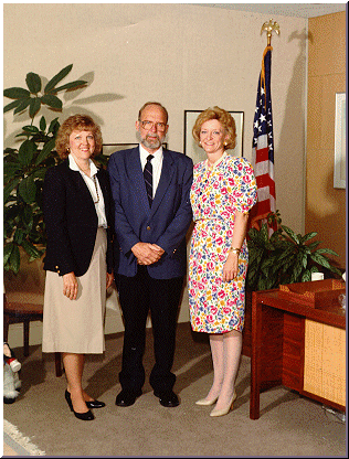 color photo of Ritter and wife with Commissioner Hardy