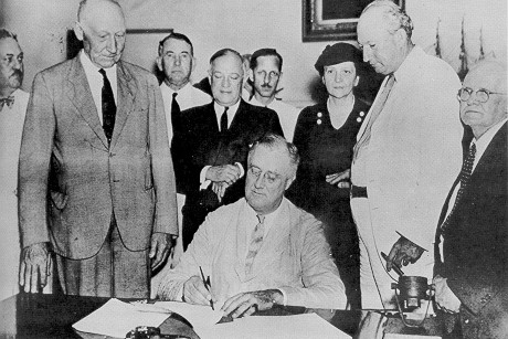 FDR signing Act in 1935