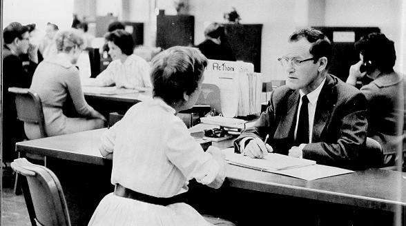 photo of people at desk