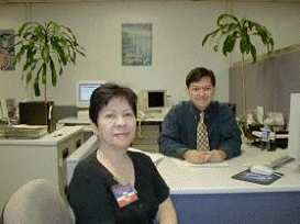 picture of two people in office