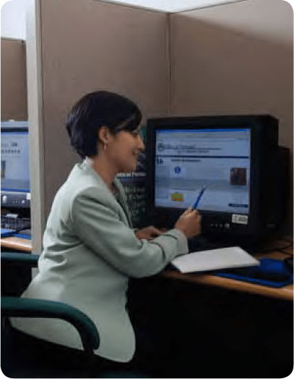 Social Security Employee at Computer