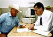 two men at desk